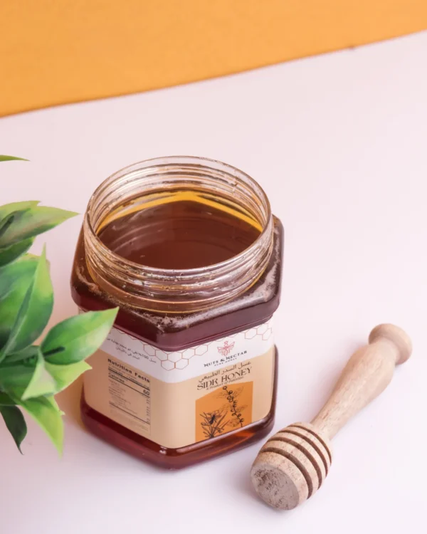 Open Jar of Sidr Honey Open jar of Sidr Honey – raw, pure honey from Nuts & Nectar Pakistan