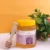 Closed jar of Caroom Ajwain Honey with wooden honey dipper – Nuts & Nectar Pakistan
