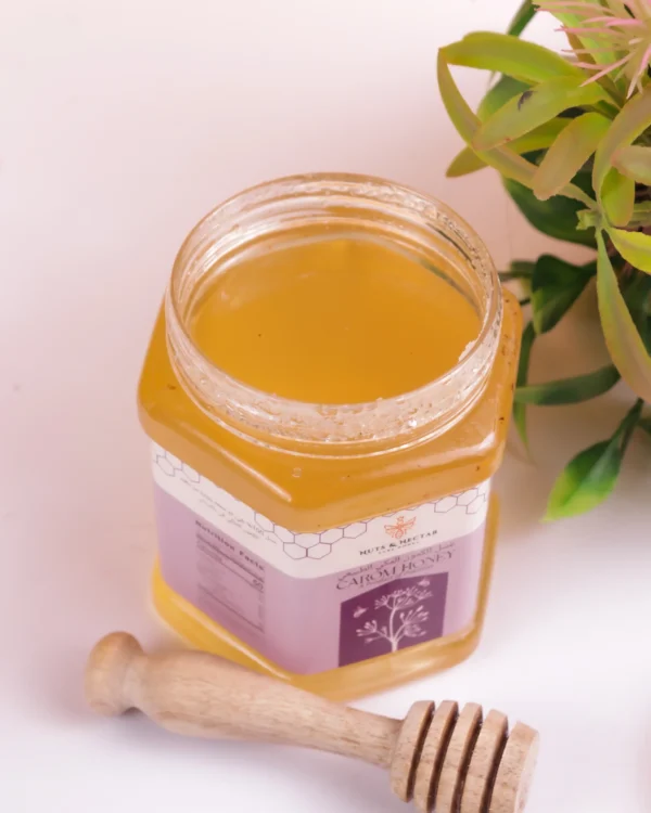 Open jar of Caroom Ajwain Honey – pure, raw honey from Nuts & Nectar Pakistan