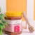 Closed jar of Buckwheat Honey with wooden honey dipper – Nuts & Nectar Pakistan