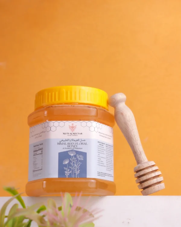 Himalayan Floral Honey with Wooden Dipper Closed jar of Himalayan Floral Honey with wooden honey dipper – Nuts & Nectar Pakistan